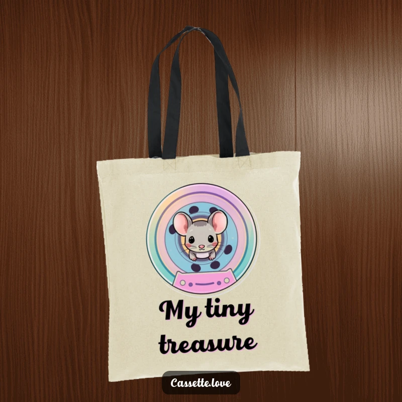 Funny tote bag featuring a tiny mouse peeking from the spool of a brightly colored cassette tape, perfect for stylish carrying.